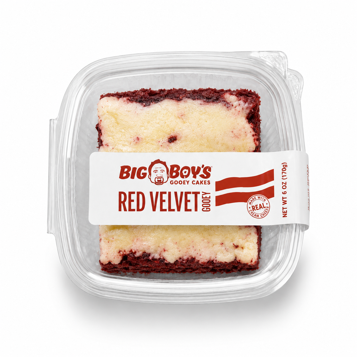 Red velvet cake in a clear plastic container with a Big Boy's Goody Cakes label on a white background