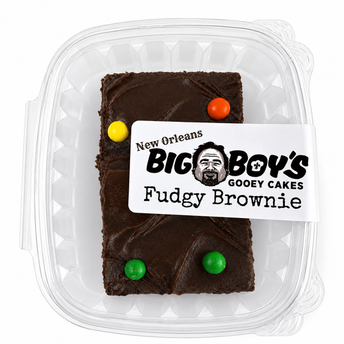 Fudgy brownie in a clear container with a label for New Orleans Big Boy's Gooey Cakes.
