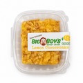 Packaged lemon cheesecake with Big Boy's Gooey Cakes label on a white background